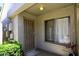 Cozy home entryway featuring a security door and a bright window, enhancing curb appeal at 2416 W Caribbean Ln # 2, Phoenix, AZ 85023