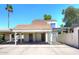 Charming home featuring a covered parking area and desert landscaping on a sunny day at 2416 W Caribbean Ln # 2, Phoenix, AZ 85023