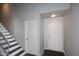 This is an interior shot of the home's stairwell and front entryway at 2416 W Caribbean Ln # 2, Phoenix, AZ 85023