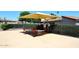 Community poolside with seating for residents, offering a relaxing outdoor space at 2416 W Caribbean Ln # 2, Phoenix, AZ 85023