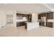 Spacious kitchen featuring stainless steel appliances, a large island, and open layout at 25347 N 176Th Ave, Surprise, AZ 85387