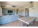 Bright, open living area featuring a kitchen island and dining table at 26072 N 74Th Ave, Peoria, AZ 85383