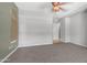 Neutral bedroom with carpeted flooring and shuttered windows at 26135 N Desert Mesa Dr, Surprise, AZ 85387