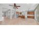 Expansive kitchen with stainless steel appliances, island, and ample cabinet space, seamlessly connected to living areas at 26135 N Desert Mesa Dr, Surprise, AZ 85387