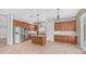 Modern kitchen featuring stainless steel appliances, an island, and plenty of cabinet storage for all your culinary needs at 26135 N Desert Mesa Dr, Surprise, AZ 85387