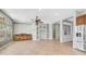 Bright and airy living room with built-in shelving and open floor plan at 26135 N Desert Mesa Dr, Surprise, AZ 85387