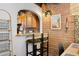 Kitchen bar with brick wall, seating and decor at 3032 N 32Nd St # 61, Phoenix, AZ 85018