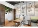 Bright office with wooden desk and a plant-themed closet with folding doors for storage at 3032 N 32Nd St # 61, Phoenix, AZ 85018