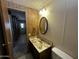 Bathroom featuring a vanity with a marble countertop and an oval mirror at 3104 E Broadway Rd # 268, Mesa, AZ 85204