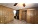 Bedroom featuring built-in storage and closet with tan walls and carpet at 3104 E Broadway Rd # 268, Mesa, AZ 85204