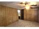 Bedroom with lighted ceiling fan, carpet, closet, and access to bathroom at 3104 E Broadway Rd # 268, Mesa, AZ 85204