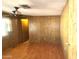 Bedroom with wood-look flooring and a ceiling fan at 3104 E Broadway Rd # 268, Mesa, AZ 85204