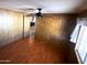 Bedroom boasting hardwood flooring and a light-filled window at 3104 E Broadway Rd # 268, Mesa, AZ 85204