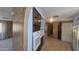 Bright kitchen with tiled floors and wooden cabinetry with white appliances at 3104 E Broadway Rd # 268, Mesa, AZ 85204
