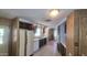 Traditional kitchen featuring white appliances, dark cabinetry, and a convenient layout at 3104 E Broadway Rd # 268, Mesa, AZ 85204