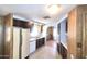 An open kitchen with ample cabinet space and a view of the living area at 3104 E Broadway Rd # 268, Mesa, AZ 85204