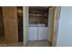 Laundry closet with washer and dryer behind bi-fold doors at 3104 E Broadway Rd # 268, Mesa, AZ 85204