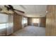 Neutral living room with plush carpeting, natural lighting, and ceiling fan at 3104 E Broadway Rd # 268, Mesa, AZ 85204