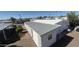 Manufactured home with a low maintenance yard, featuring additional exterior storage at 3104 E Broadway Rd # 268, Mesa, AZ 85204