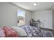 Bright bedroom featuring stylish bedding, soft gray rug, and a modern work desk at 320 E Mckellips Rd # 25, Mesa, AZ 85201