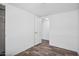 Bright bedroom with neutral colors, laminate flooring, and access to closet at 320 E Mckellips Rd # 25, Mesa, AZ 85201