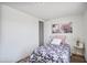 Well-lit bedroom with stylish bedding and decor, leading to closet and other rooms at 320 E Mckellips Rd # 25, Mesa, AZ 85201