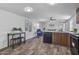 Living room with wood floors, stainless steel appliances and minimalist decor at 320 E Mckellips Rd # 25, Mesa, AZ 85201