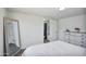 Serene main bedroom featuring closet, dresser, minimalist decor, and wood floors at 320 E Mckellips Rd # 25, Mesa, AZ 85201