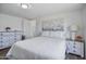 Cozy main bedroom with a soft bed, minimalist decor, and a view of the backyard at 320 E Mckellips Rd # 25, Mesa, AZ 85201