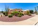 Well-maintained single-story home featuring desert landscaping and a charming fence at 3535 E Brookwood Ct, Phoenix, AZ 85048