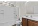 A bathroom with a shower-tub combo, toilet, sink, mirror and vanity at 3575 E Gary Way, Gilbert, AZ 85234
