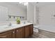 Bathroom features a double sink vanity, a toilet, and a shower at 3575 E Gary Way, Gilbert, AZ 85234