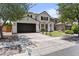 Charming two-story house featuring a well-maintained lawn and a spacious driveway at 3575 E Gary Way, Gilbert, AZ 85234