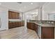 Charming kitchen with stainless steel appliances, ample storage, and a view of the dining area at 3575 E Gary Way, Gilbert, AZ 85234