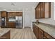 Lovely kitchen featuring stainless steel appliances, plenty of cabinet space, and stylish countertops at 3575 E Gary Way, Gilbert, AZ 85234