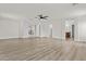 This living room is very bright, open and features hard wood flooring at 3575 E Gary Way, Gilbert, AZ 85234