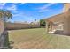 A large backyard offers ample space with a covered patio and block fence providing privacy at 3882 S Hawthorn Dr, Chandler, AZ 85248