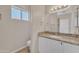 Bathroom featuring a white vanity and a toilet at 3882 S Hawthorn Dr, Chandler, AZ 85248