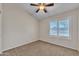 Bedroom featuring neutral carpet and shuttered window at 3882 S Hawthorn Dr, Chandler, AZ 85248