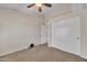 This bedroom features neutral walls, carpet and ceiling fan, offering a calm and comfortable space at 3882 S Hawthorn Dr, Chandler, AZ 85248