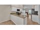Bright kitchen featuring stainless steel appliances and granite countertops at 3882 S Hawthorn Dr, Chandler, AZ 85248