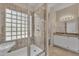 Bathroom featuring a glass shower with granite surround at 3882 S Hawthorn Dr, Chandler, AZ 85248