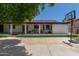 The backyard is designed for entertaining, with a large patio area, lush landscaping and a basketball hoop at 428 S Sunnyvale --, Mesa, AZ 85206
