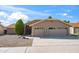 Charming single-story home with a two-car garage, well-maintained landscaping, and a classic desert aesthetic at 4439 W Cielo Grande --, Glendale, AZ 85310