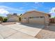 Well-kept home features a two-car garage and low-maintenance desert landscaping, reflecting a suburban lifestyle at 4439 W Cielo Grande --, Glendale, AZ 85310