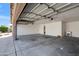 Spacious garage with ample storage and a utility sink at 4439 W Cielo Grande --, Glendale, AZ 85310