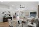 Open-concept living area with stylish furnishings and seamless transition to dining, perfect for modern living at 4439 W Cielo Grande --, Glendale, AZ 85310