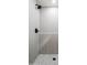 Close-up of a shower with a rainfall showerhead and patterned shower floor at 4439 W Cielo Grande --, Glendale, AZ 85310