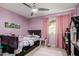 Cozy ' bedroom with pink walls, comfortable bed, and cheerful decor at 5354 E Ellis St, Mesa, AZ 85205