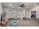 Bright and cheerful living space featuring a large bay window and an open doorway, perfect for Gathering activities at 5354 E Ellis St, Mesa, AZ 85205